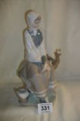 A Lladro girl with dove