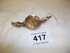 A Victorian gold fob watch converted to wrist watch