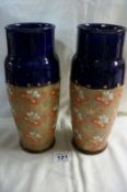 A pair of Royal Doulton stoneware vases