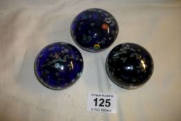 3 signed glass paperweights