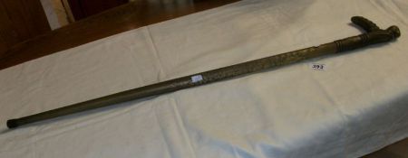 An old sword stick with Chinese head to handle (tip of sword missing)