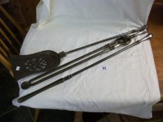 A set of 3 old steel fire irons