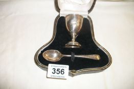 A cased silver Christening set being egg cup and spoon