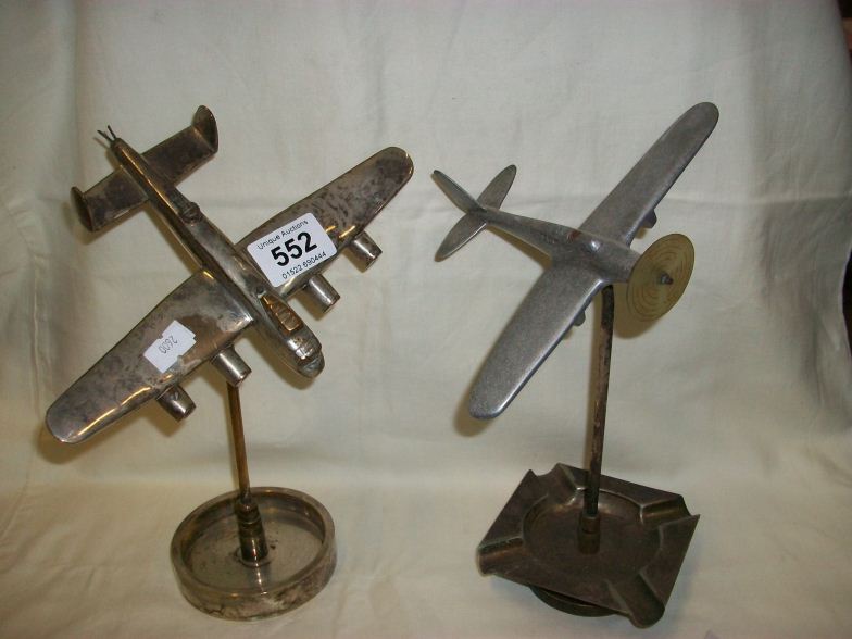 2 ashtrays surmounted aeroplanes