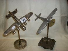 2 ashtrays surmounted aeroplanes