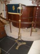 A Victorian brass standard lamp