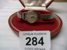 A 1960's Omega wristwatch in original box and with original paperwork