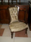 A Victorian leather covered ladies chair