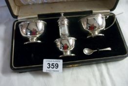 A cased silver 3 piece condiment set