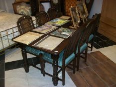 A heavy oak table and 6 chairs