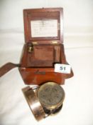 A boxed brass airmeter No. 1096 by J Sasarelli & son (missing one blade from fan)