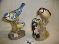 A Royal Worcester Blue Tits and Pied Woodpecker