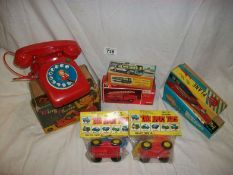 A quantity of tin plate and plastic toys including helicopter, fire engine etc.