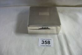 A silver cigarette box