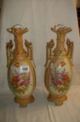 A pair of Austrian Hand painted vases