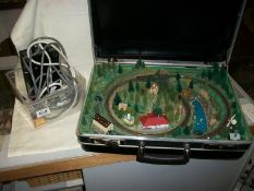 A Marklin Z gauge train set layout, scratch build in 1990, in antler case and with 2 loco's and