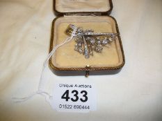 An 18ct gold and diamond floral spray brooch