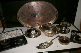 A large silver plated gallery tray, wine coaster, teapot and other silver plated items