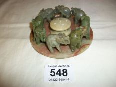 A ring of carved stone elephants