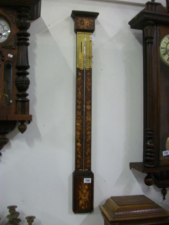 A mahogany inlaid stick barometer