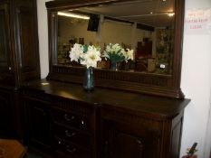 A large oak mirror backed sideboard