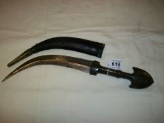 An antique Turkish dagger with rhino horn handle