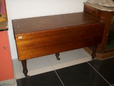 A large Victorian mahogany Pembroke table