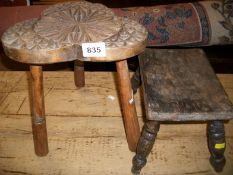 2 old milking stools