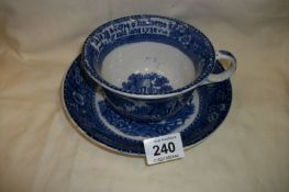 A large Burslem blue and white 'auld Lang Syne' cup and saucer