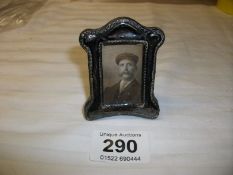 A miniature silver photo frame (some dints)