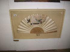 A framed hand painted fan