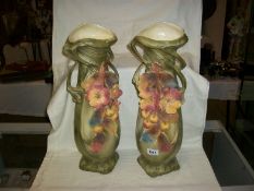 A pair of Royal Dux vases