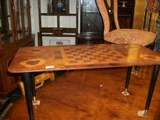 A retro coffee table with chess board top