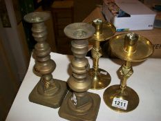 2 pairs of brass candlesticks