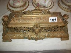 A large brass inkstand