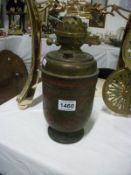 A Victorian metal oil lamp base with brass font