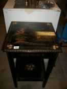 An Oriental style lacquered side table
