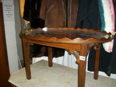A mahogany inlaid table