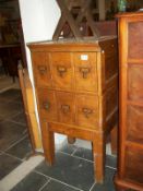 An oak card index cabinet