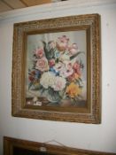 A gilt framed and glazed watercolour floral arrangement bearing the signature Frank Lonsdale