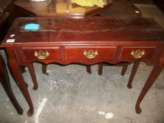 A mahogany console table