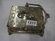 A silver plate and glass sardine dish