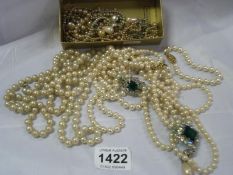 A quantity of pearl necklaces and pearls