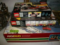 A Lehman boxed cable car and 2 Lego techno sets