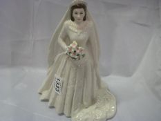 A Royal Worcester figurine, Queen Elizabeth II.