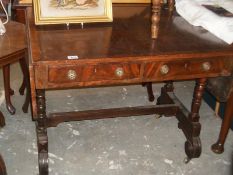 A mahogany sofa table