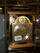 A lacquered mantel clock