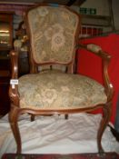 A mahogany elbow chair