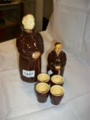 A Monk decanter, Monk figure and 4 beakers