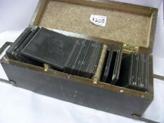 A box of 19th century battle scene magic lantern slides